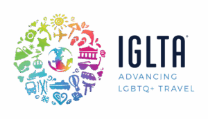 IGLTA logo in rainbow with tagline “Travel. Learn. Connect.” representing membership in the International LGBTQ+ Travel Association.